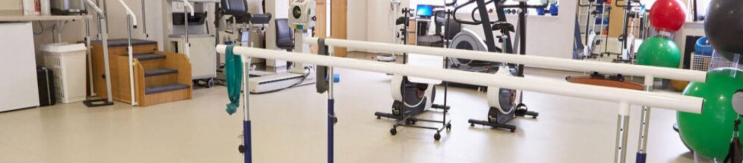 Inner View Of Physiotherapy Clinic With Equipment For Rehabilitation